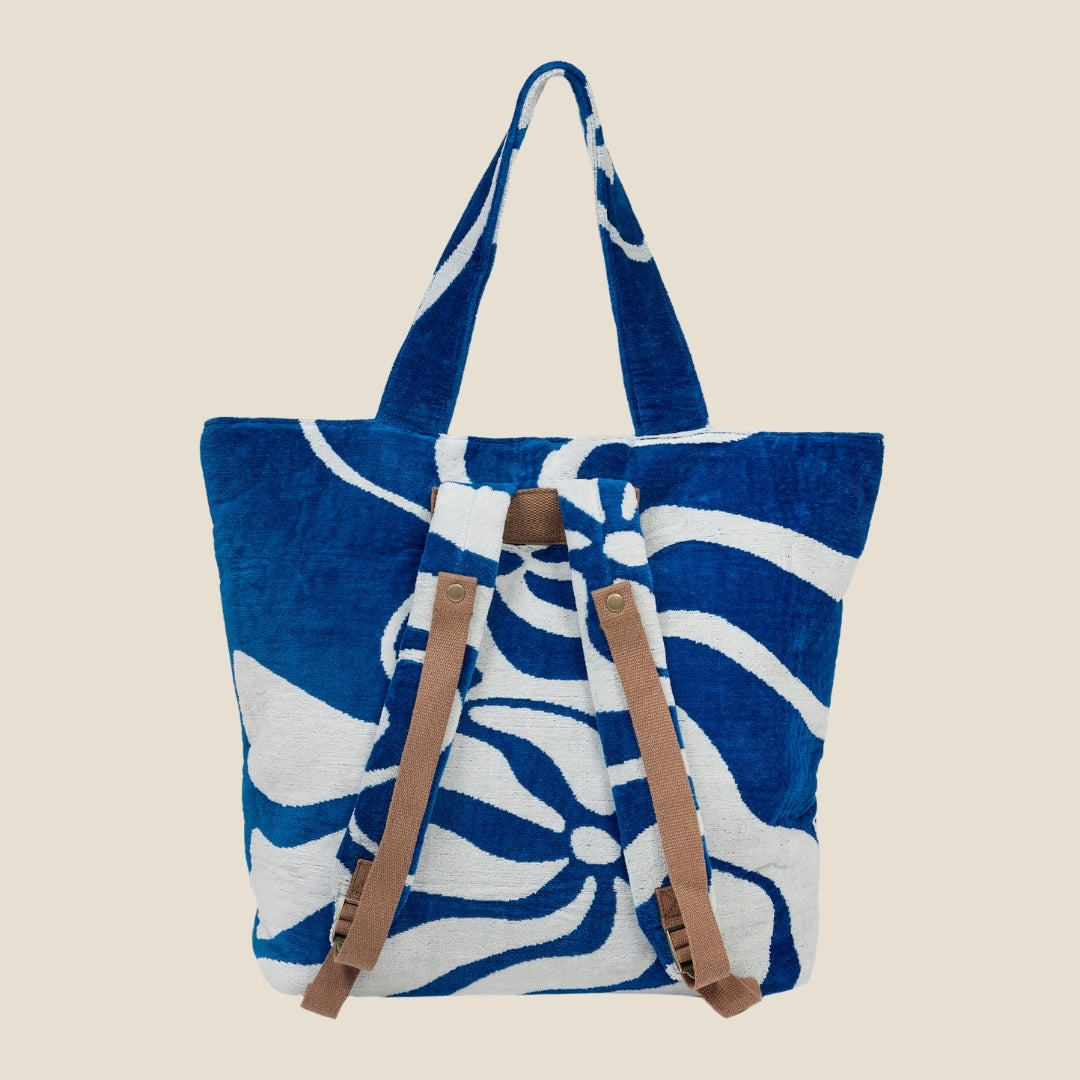 SomerSide Drift 40L cotton towelling beach bag showing adjustable backpack straps